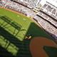 Illustration for article titled Watch the Navy parachute team jump and land inside a baseball stadium